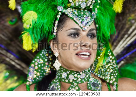 RIO DE JANEIRO - FEBRUARY 10: A woman in costume dancing on carnival at Sambodromo in Rio de Janeiro February 10, 2013, Brazil. The Rio Carnival is biggest carnival in world.