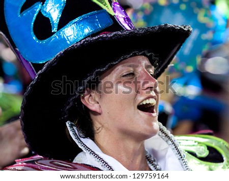 RIO DE JANEIRO - FEBRUARY 11: A woman  in costume singing and dancing on carnival at Sambodromo in Rio de Janeiro February 11, 2013, Brazil. The Rio Carnival is biggest carnival in world.
