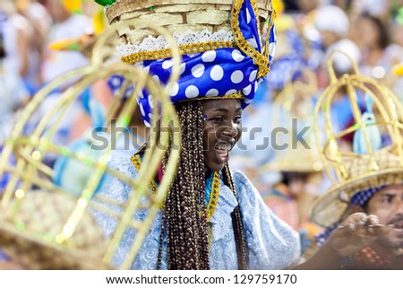 RIO DE JANEIRO - FEBRUARY 11: A woman in costume singing and dancing on carnival at Sambodromo in Rio de Janeiro February 11, 2013, Brazil. The Rio Carnival is biggest carnival in world.