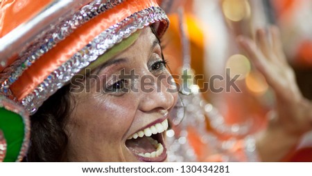 RIO DE JANEIRO - FEBRUARY 10: A woman in costume dancing and singing on carnival at Sambodromo in Rio de Janeiro February 10, 2013, Brazil. The Rio Carnival is biggest carnival in world.