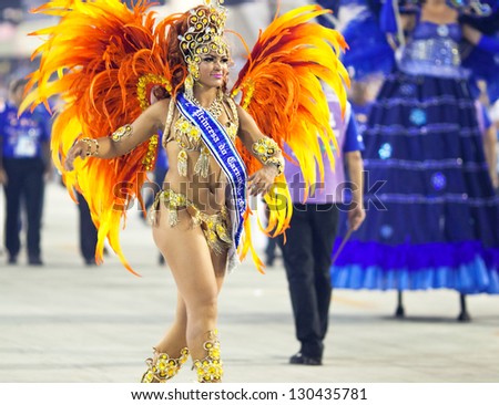 RIO DE JANEIRO - FEBRUARY 10: A woman in costume dancing on carnival at Sambodromo in Rio de Janeiro February 10,  2013, Brazil. The Rio Carnival is biggest carnival in world.