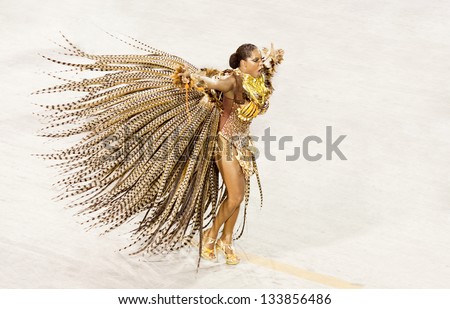 RIO DE JANEIRO - FEBRUARY 11: A woman in costume dancing on carnival at Sambodromo in Rio de Janeiro February 11, 2013, Brazil. The Rio Carnival is biggest carnival in world.