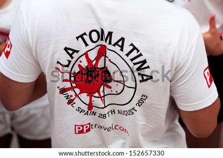 Bunol, Spain - August 28: A man in a T-shirt with  logo on Tomatina festival in Bunol, August 28, 2013 in Spain