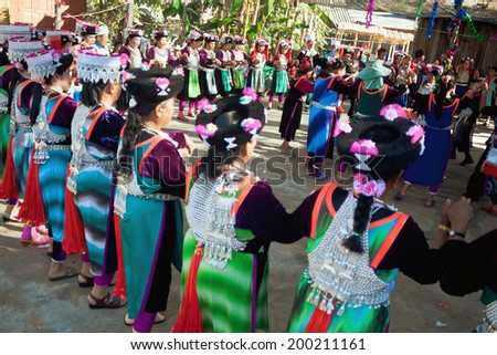 LISU, THAILAND - FEBRUARY 7: Ritual dance of women in national costumes during the Spring Festival (Chinese New Year) in mountain village of Lisu, province of Mae Hong Son, Thailand, February 7, 2014