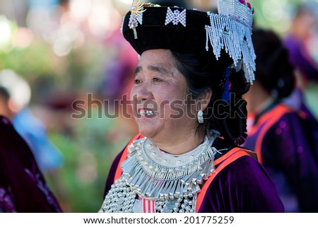 LISU, THAILAND - FEBRUARY 7: Women in national costumes during Spring Festival (Chinese New Year) in village of Lisu, province of Mae Hong Son, Thailand, February 7, 2014