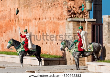RABAT, MOROCCO - NOVEMBER 25: Royal guard in front of Hassan Tower and Mausoleum of Mohammed V. Mausoleum contains tombs of late King Hassan II and Prince Abdallah. November 25, 2014 in Rabat, Morocco