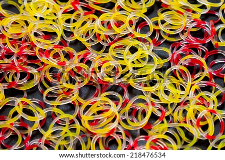 Colored rubber bands photographed in plan