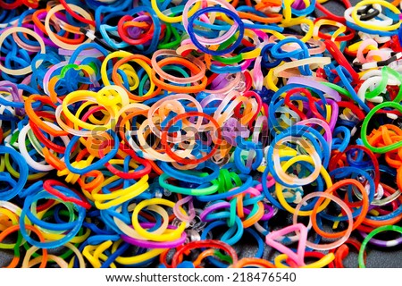 Colored rubber bands photographed in plan