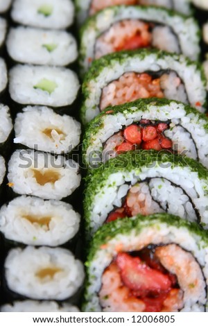 Array of sushi rolls all lined up