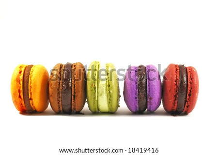 row of five macaroons on white background