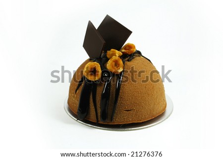 dome shaped chocolate mousse cake on isolated white background