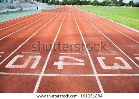 Starting Line of Track Running Lanes in Sports Arena.