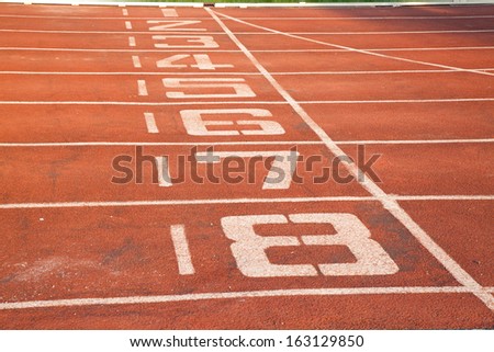 Starting Line of Track Running Lanes in Sports Arena.
