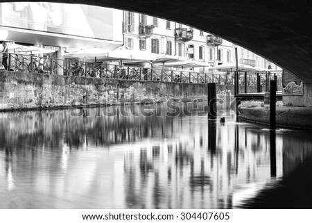 MILAN, ITALY  JULY 21: summer night view of the famous Navigli district, in Milan city (Lombardy, Northern Italy), fun area known for the many pubs and nightclubs. Milan, July 21, 2015.