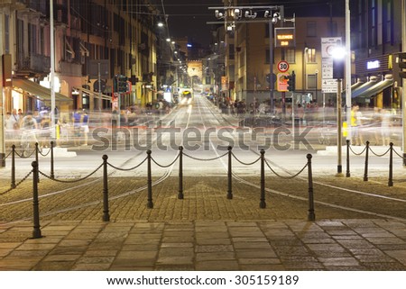MILAN, ITALY - JULY 21: night view of the traffic in the city center of Milan (Lombardy, Northern Italy), in the famous district called \
