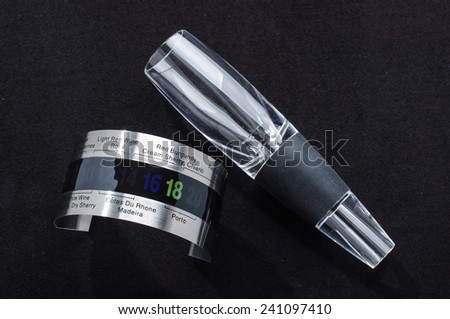 Wine serving accessories isolated on the dark background