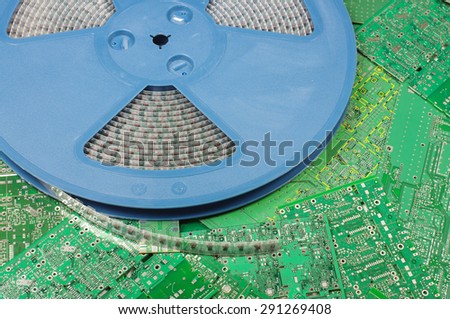 Electronics component in pick and place machine reel prepared for PCB assembling