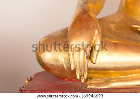 Hand of an ancient Buddha image at Sukhothai historical park, Thailand