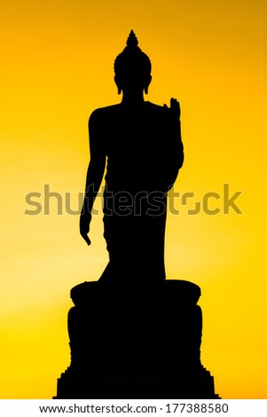 silhouette of Buddha statue