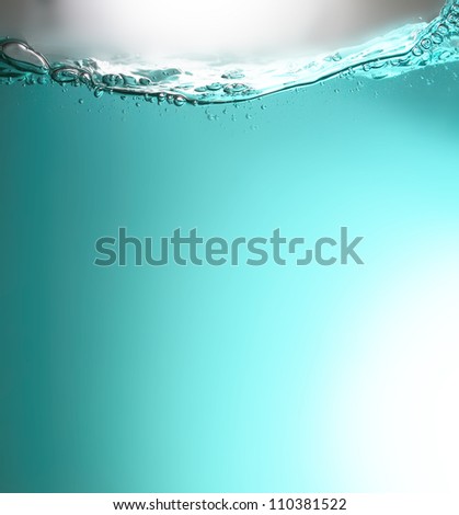Clean water wave with bubbles.
