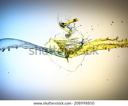 clash of yellow and blue liquid jets