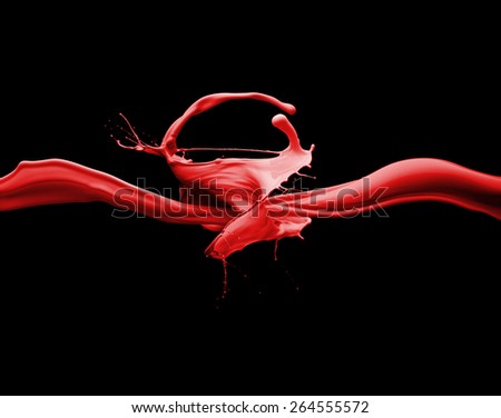 Splashes of red liquid isolated on black background template