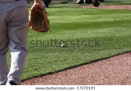 baseball player and baseball ball
