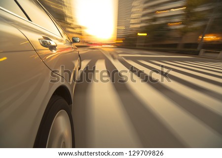 Driving in the sunset city.
