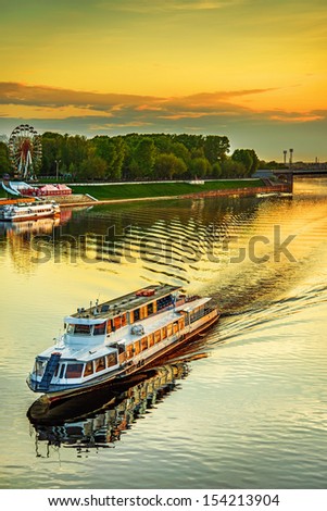 Motor Ship At Sunset Sails On River Volga In Tver, Russia.