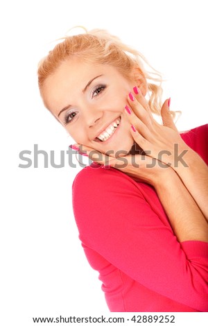 Charming young woman in red blouse jokes and laughs, it is isolated on white background.