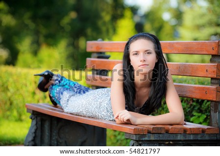 Stealing Couldn't be Funner - Page 26 Stock-photo-beautiful-dark-haired-girl-lies-on-bench-in-park-54821797