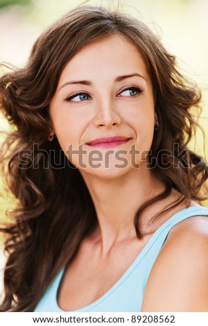portrait charming modest young woman closeup looks toward outdoor