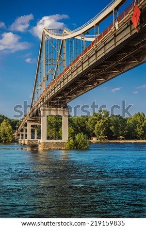 Park Bridge - a pedestrian bridge across Dnieper River, which connects central part of Kiev with parklands and beaches Trukhaniv island.