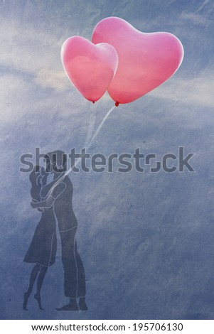couple in love kissing under the open sky, a couple of balloons in the shape of heart