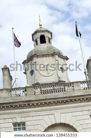 Horse Guards London clock tower with two flags from below