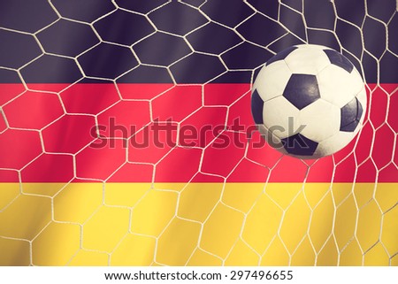 soccer ball on Germany flag vintage color