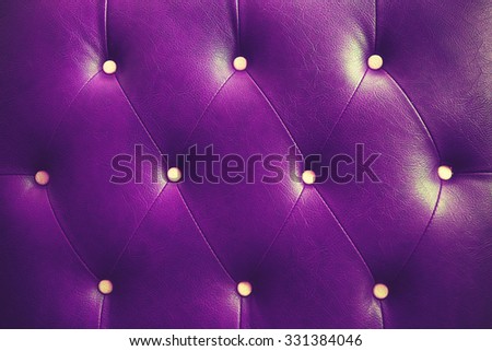 Genuine leather upholstery background for a luxury decoration in purple tones vintage color