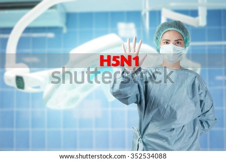 scientist in safety suit warn with word H5N1