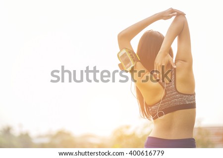 Women exercising.Women exercising in sunny bright light.