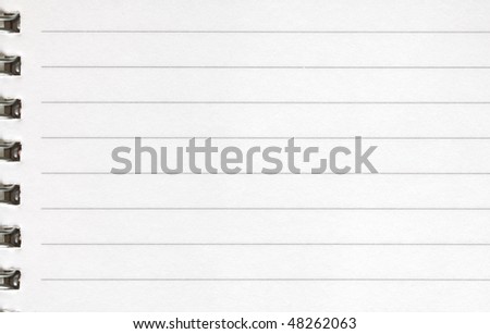 Background of lined white paper with spiral metal binding