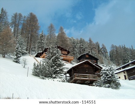 Swiss chalets (wood constructions) during the winter season