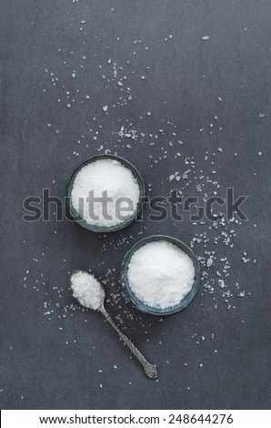 Salt in rustic ceramic bowls, top view