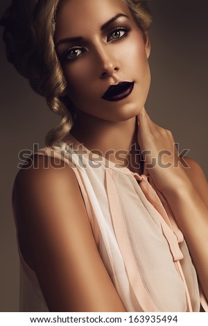 blond woman with plum color lips