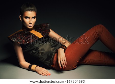 glamorous hot woman laying on the floor