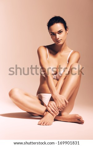 sepia healthy woman sitting on the floor