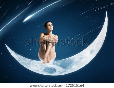 healthy woman sitting on shiny moon