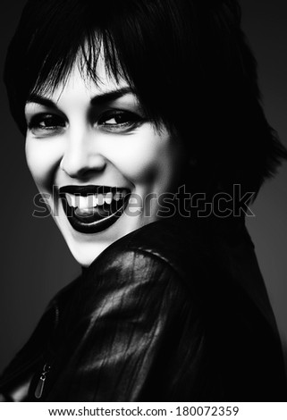 black and white woman showing tongue