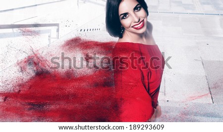 brunette woman with bob cut and red powder