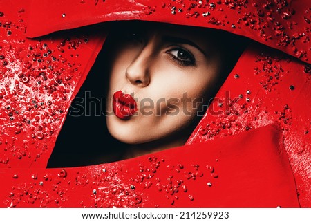 kissing sexy woman in red frame