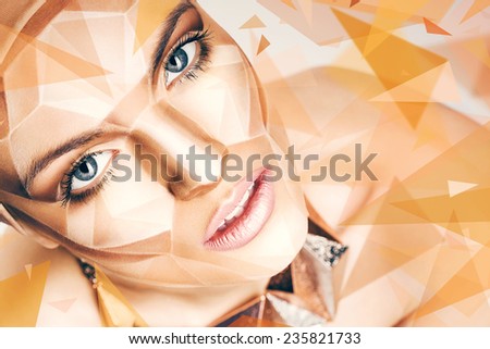 beautiful woman with bodyart on face and geometric shapes around